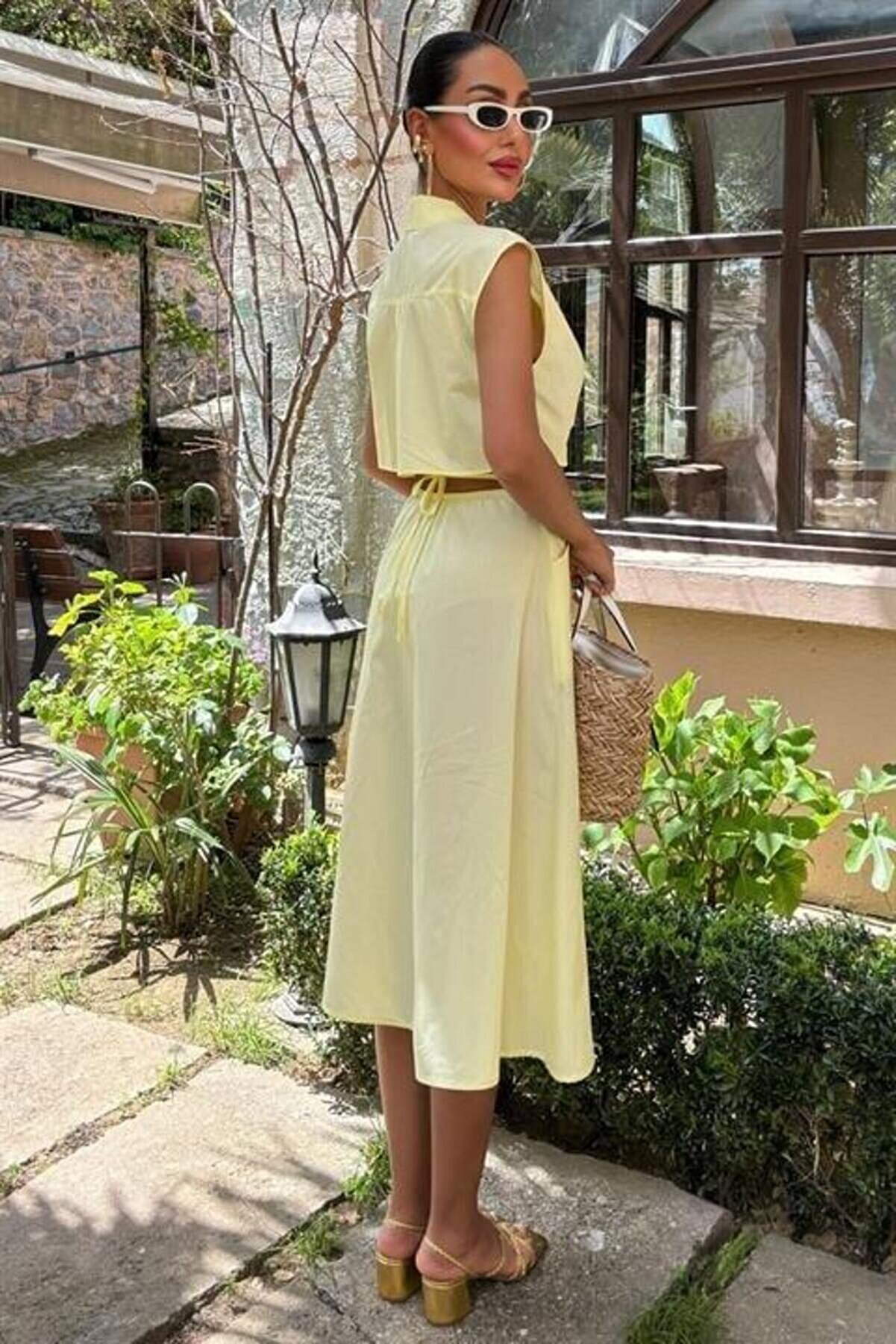 Göbeği̇ Halka Detaylı Mi̇di̇ Boy Elbi̇se 2896