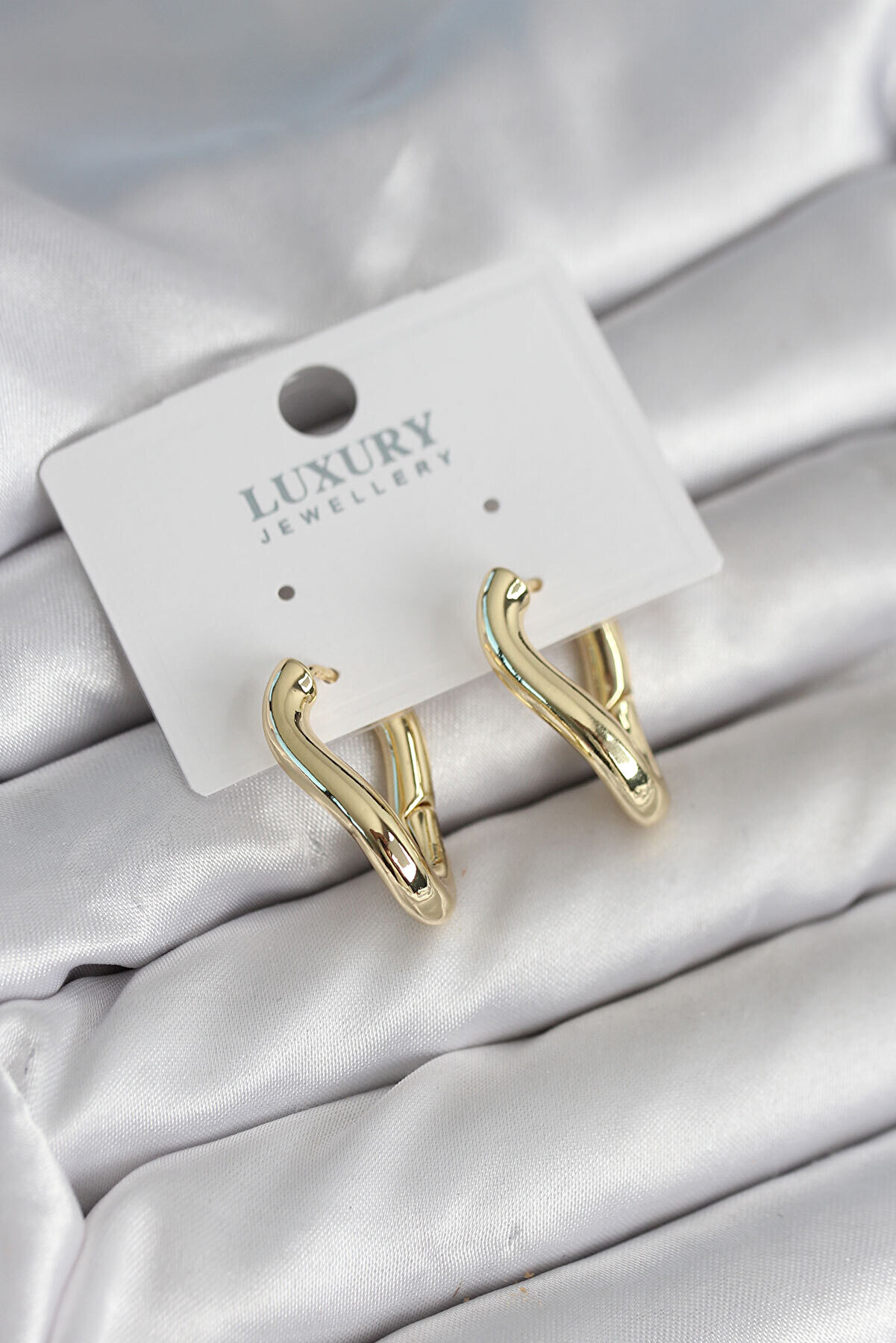 Toptan Bulurum Gold Renk Eğik Halka Model Pirinç Kadın Küpe