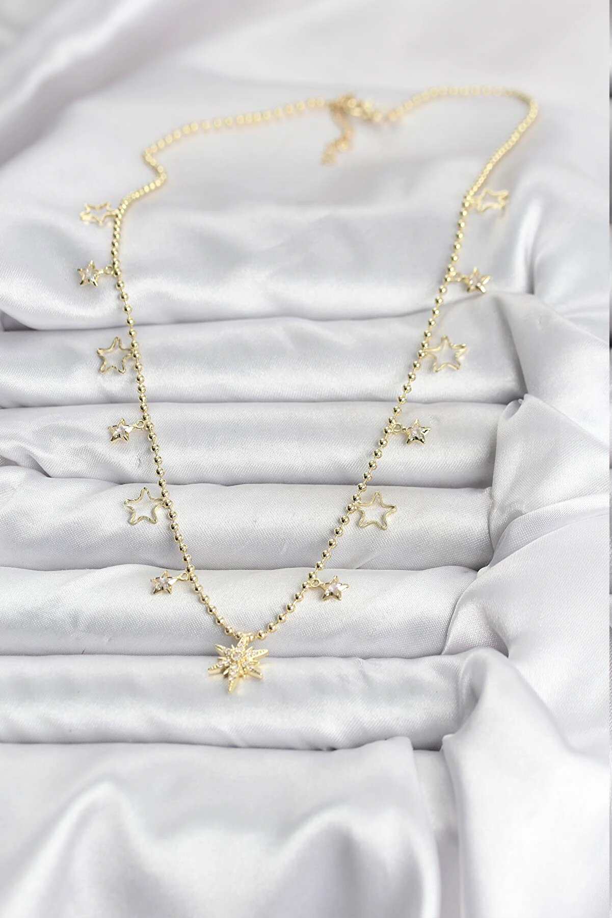 Clari̇ss Harmonyaura Pi̇ri̇n&ccedil; Gold Renk Zi̇rkon Taşlı Kutup Yıldızı Model Kadın Kolye