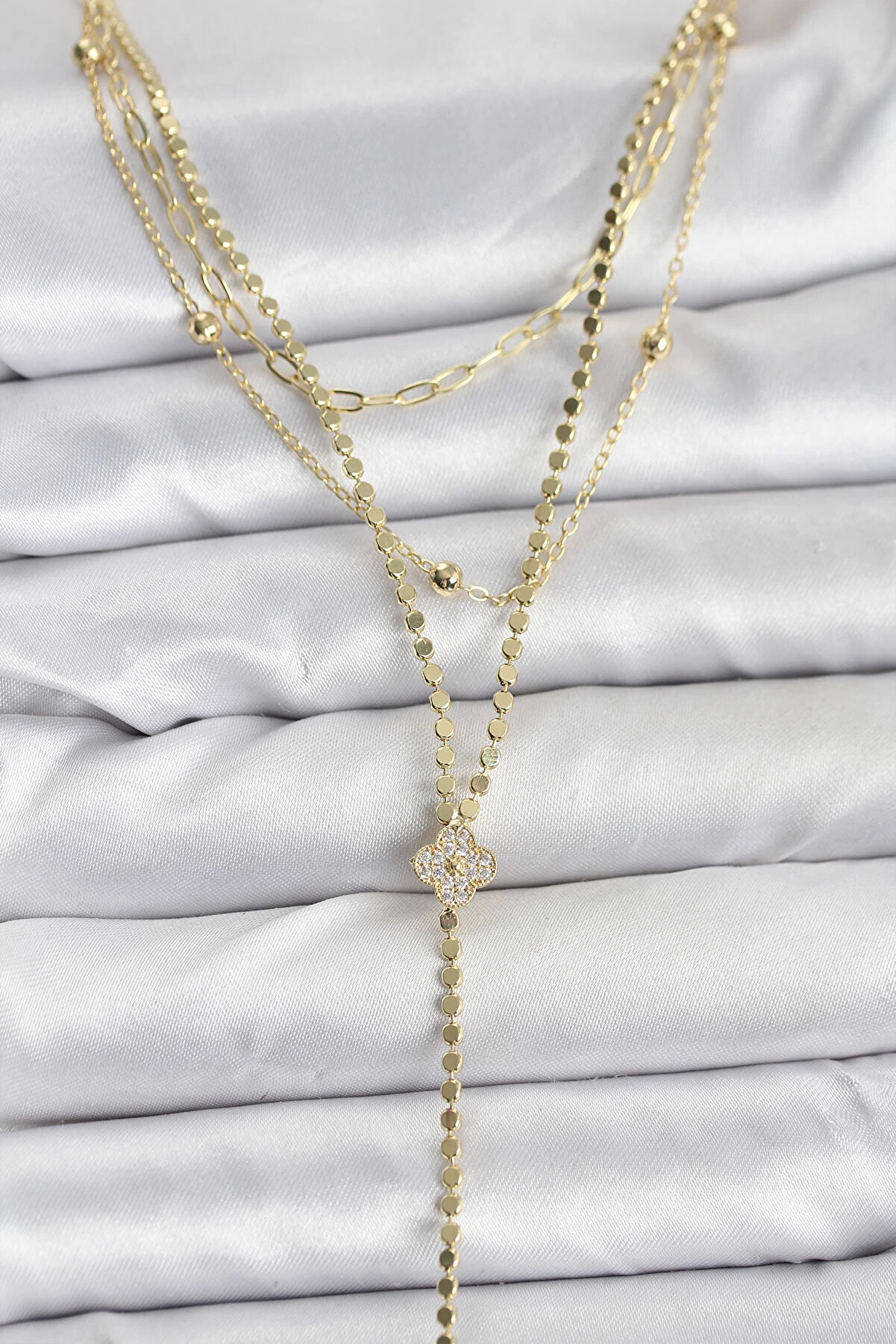 Buti̇k Pi̇ri̇n&ccedil; Gold Renk Zi̇rkon Taşlı Yonca Model Detaylı 3 L&uuml; Kombi̇n Y Kadın Kolye