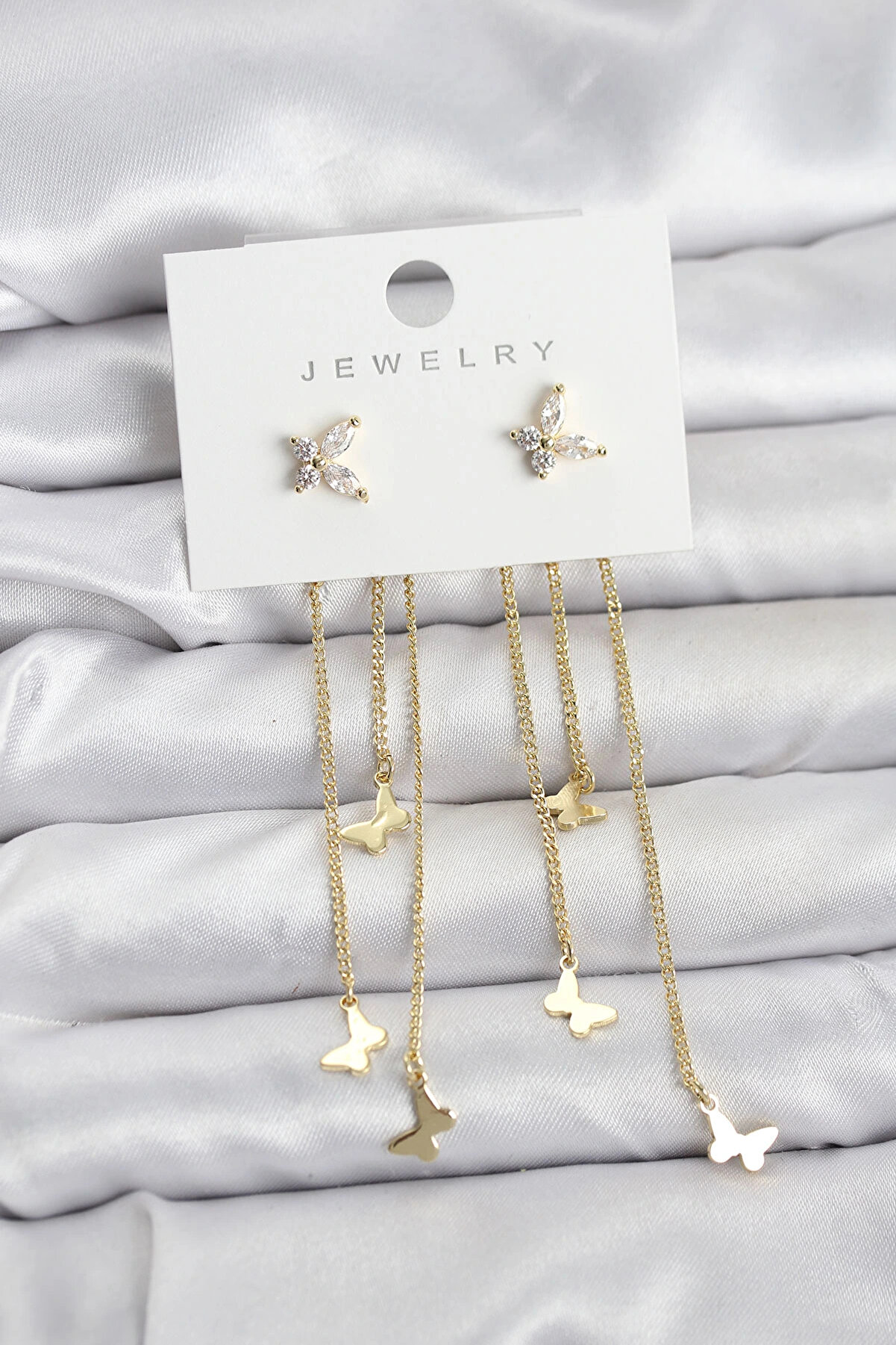 Buti̇k Kelebek Model Gold Renk Pi̇ri̇n&ccedil; Sallantılı Kadın K&uuml;pe