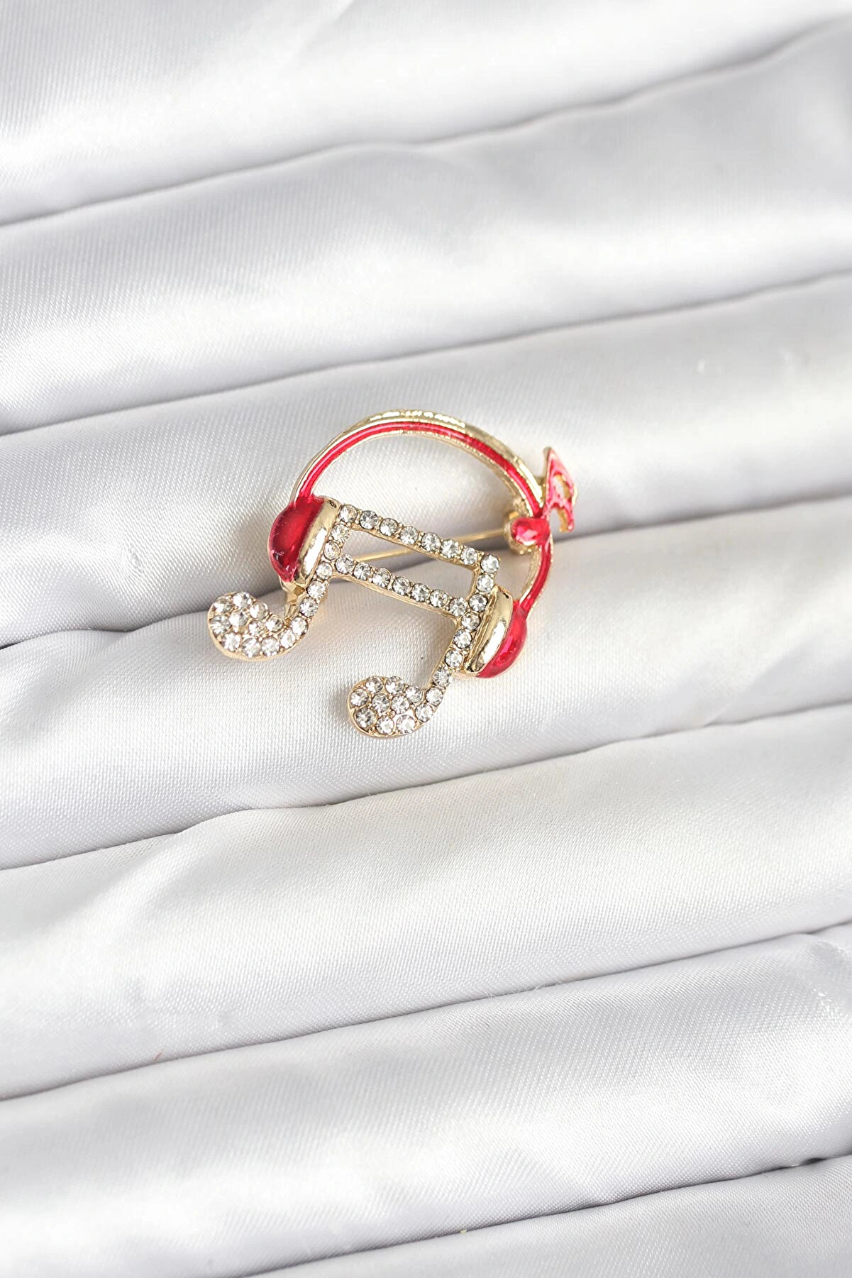 Buti̇k Kulaklıklı Nota Model Broş