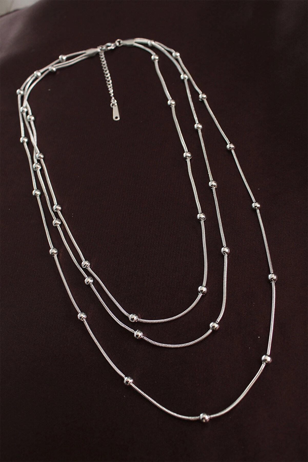 Kyops Harmonyaura 316L &Ccedil;eli̇k G&uuml;m&uuml;ş Renk Mi̇ni̇mal Top&ccedil;uk Model &Ccedil;oklu Kolye