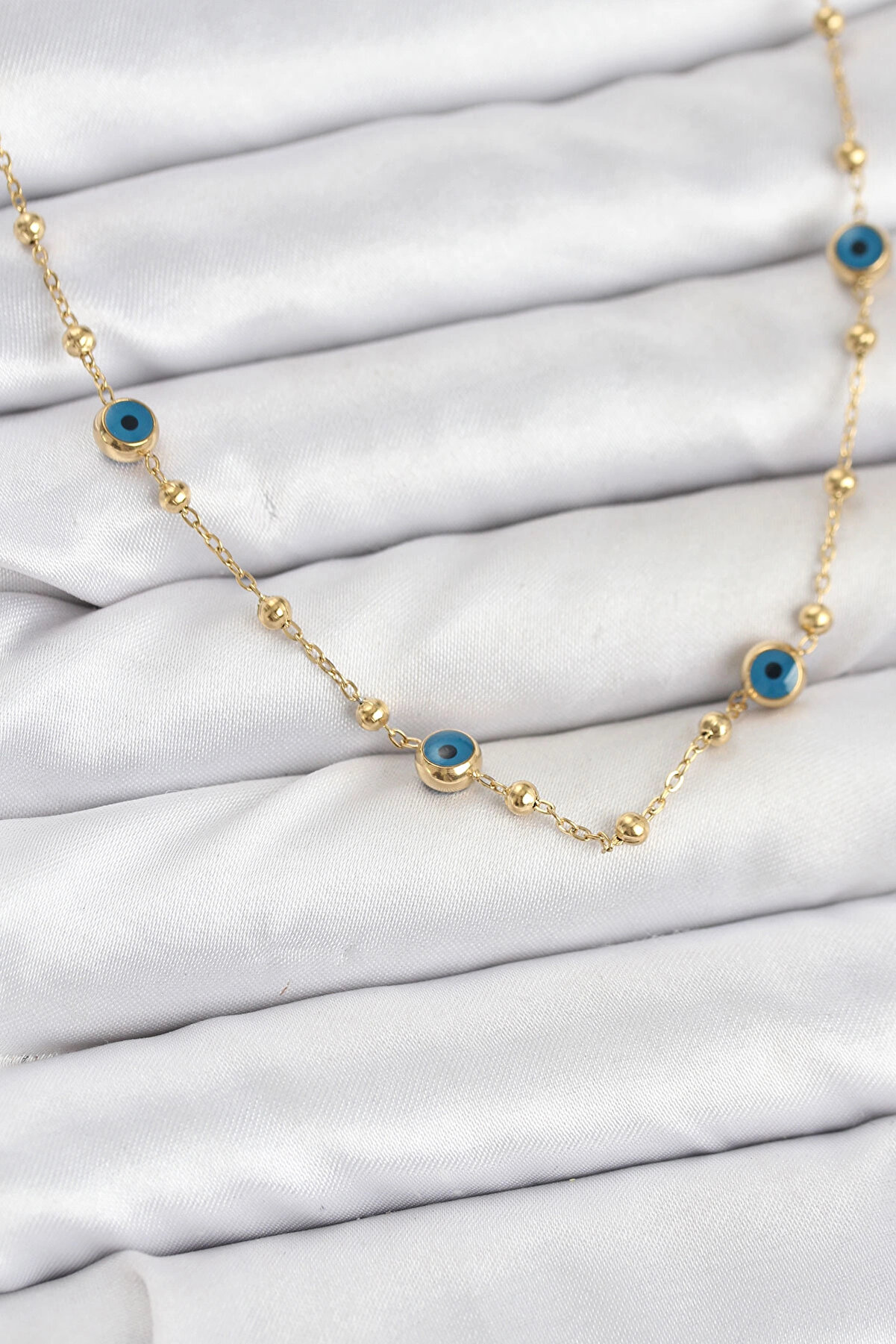 Buti̇k 316L &Ccedil;eli̇k Gold Renk Nazarlı Ve Top&ccedil;uklu Model Kadın Kolye