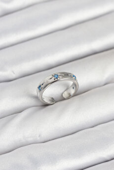 Toptan Bulurum Pirinç Gümüş Renk Mavi Zirkon Taşlı Kutup Yıldızı Model Kadın Yüzük