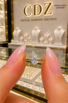 Crystal Diamond Zirconia Zarif ve kaliteli kararmayan 0.99 karat oval montür tektaş yüzük