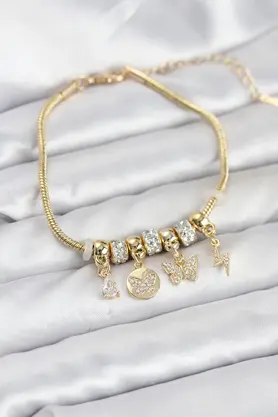 Buti̇k Pi̇ri̇nç Gold Renk Kelebek Charmlı Kadın Bi̇lekli̇k